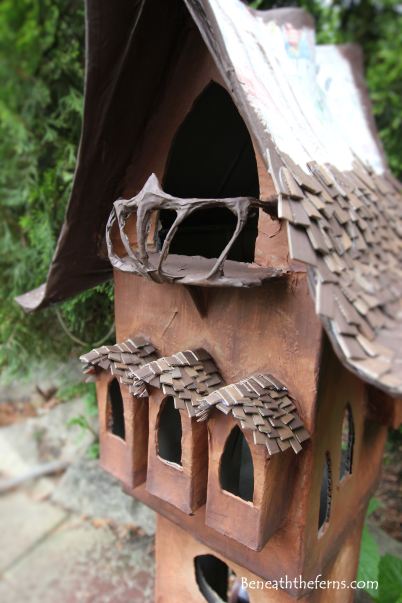 Fairy house miniature shake roof princess tower beneath the ferns